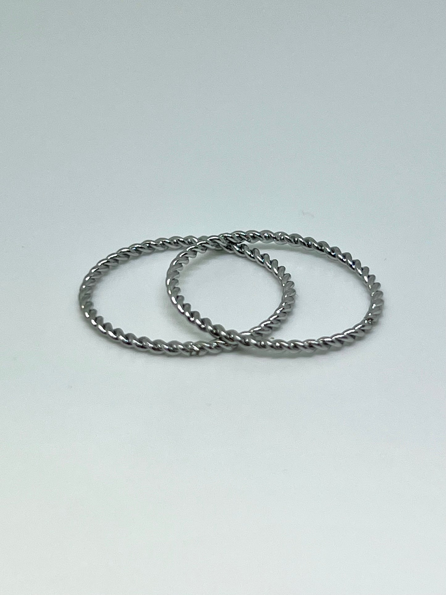 Two Silvery Stainless Steel Stackable Rings