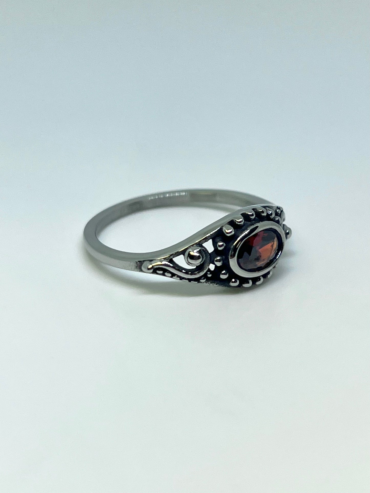 Silvery Stainless Steel Ring with Red Oval CZ Gem