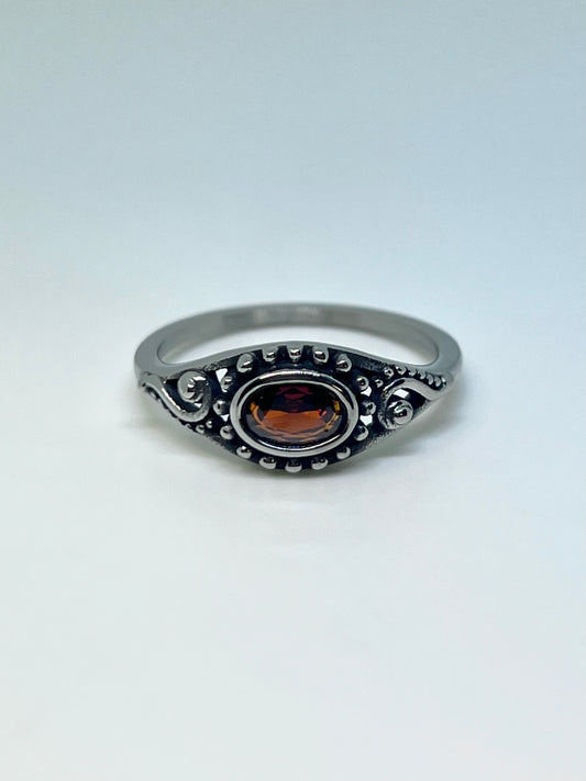 Silvery Stainless Steel Ring with Red Oval CZ Gem