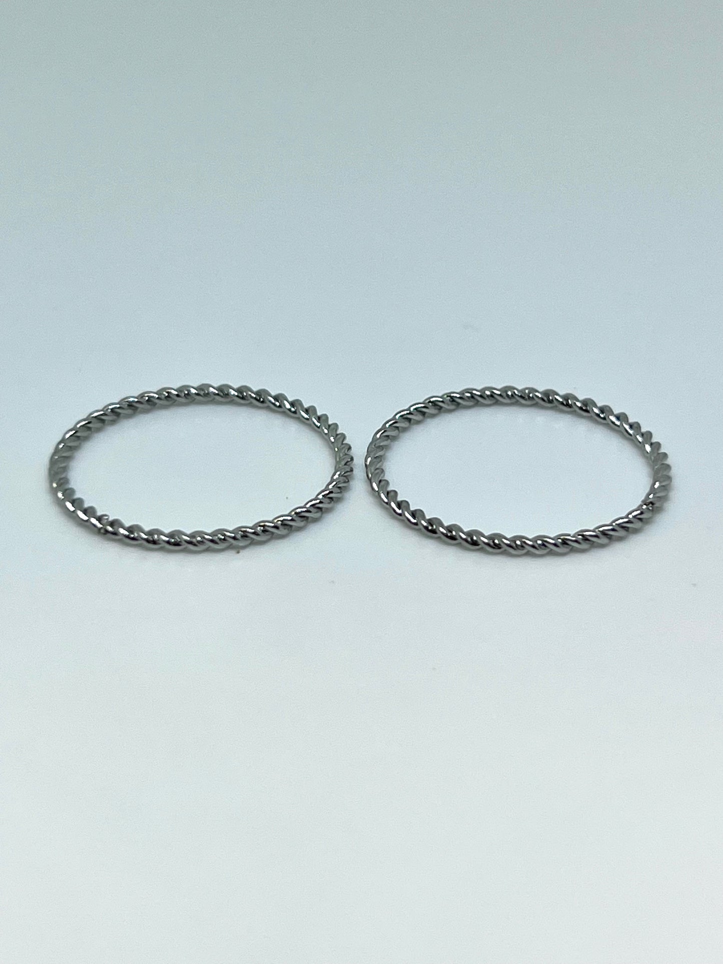 Two Silvery Stainless Steel Stackable Rings